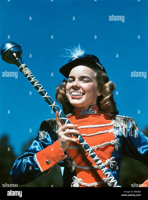 1940s 1950s Smiling Teen Girl Majorette Drum Major In Uniform Holding