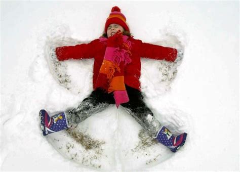 Pictures Of Kids Making Snow Angels During Winter Storm Snow Angels