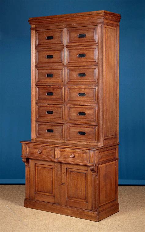 Product design and quality is value for money. Tall Oak Office Filing Cabinet C.1910. - Antiques Atlas