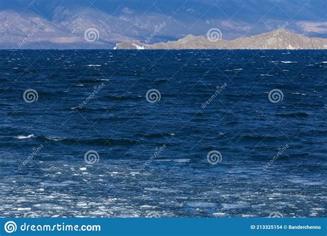 Baikal Lake In December With With Ice Blocks In Water Stock Photo