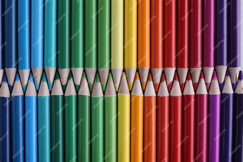 Premium Photo Set Of Colored Pastel Pencils In Row Of Multicolor In