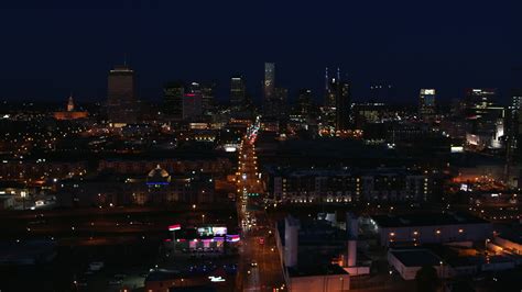 5 7k stock footage aerial video flying by church street and the city skyline at night downtown