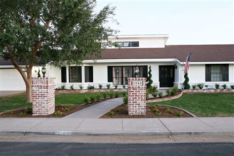 A red brick walk might look stunning against your stucco house. Modern Ranch House: Our Black and White Exterior Paint ...