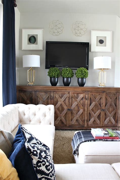 Flat screen and wall mounted tvs offered plenty of opportunities to attempt to get the tv to blend in as part of the gallery. Our Loft Makeover: The Boy's Zone - The House of Silver Lining