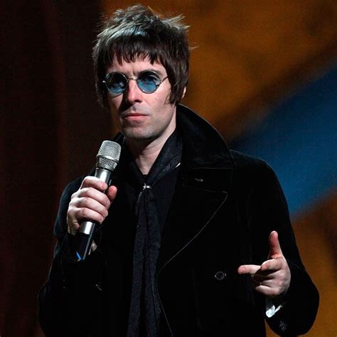 Liam Gallagher With Blue Sunglasses With Images Liam Gallagher Blue Sunglasses Sunglasses