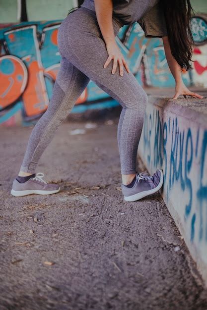 Free Photo Brunette Girl Stretching Standing Outside