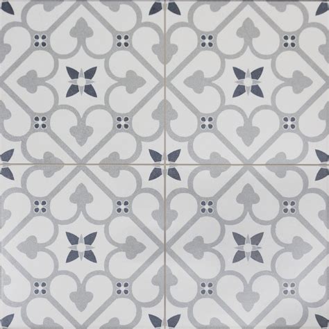 An Artistic Tile Design In Grey And White With Hearts On The Middle