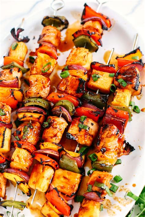 Tear a sheet of aluminum foil that is the width of the oven dish. chicken-kabobs-6 - Eat Yourself Skinny