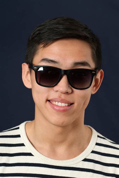 Smiling Young Asian Man In Sunglasses Stock Image Image Of Pleased
