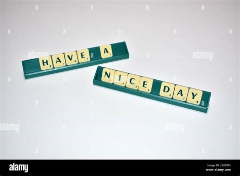 Scrabble Tiles Spell Out Have A Nice Day Motivational Quote Scrabble