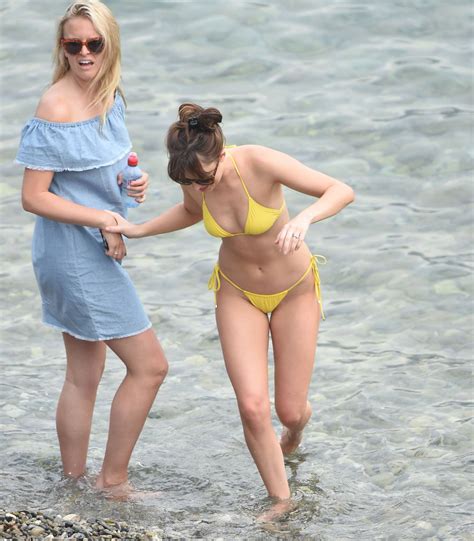 Dakota Johnson In A Yellow Bikini On The Set Of Fifty Shades Darker In France Gotceleb