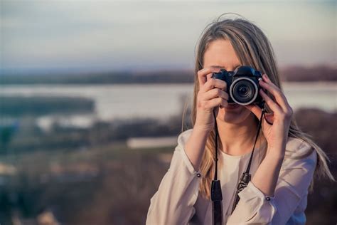 Free Photo Photographer Woman Girl Is Holding Dslr Camera Taking
