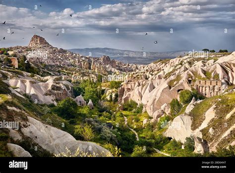 Uchisar Castle And Pigeon Valley At Cloudy Sky In Cappadocia Turkey