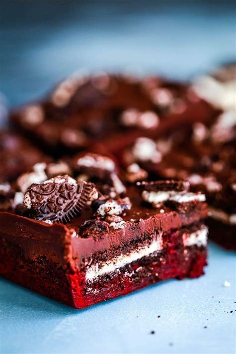 these oreo stuffed red velvet brownies are deliciously decadent a fudgy red velvet brownie base