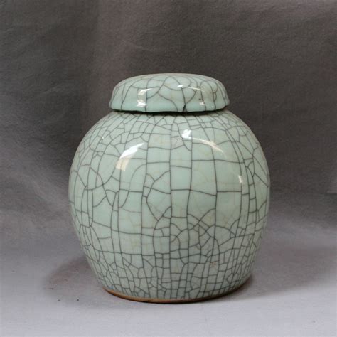 Where can i display a decorative urn in my home? RYXC11 8" and 12" Ceramic Crackle Pet Urn with Lid ...