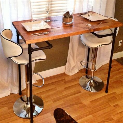 A pdf of the free plans includes diagrams, a cut list, a materials list, and building directions. Diy Bar Height Dining Table - WoodWorking Projects & Plans