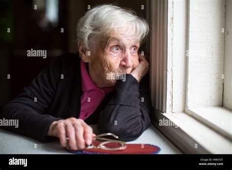Grandma Looking Out Window Hi Res Stock Photography And Images Alamy