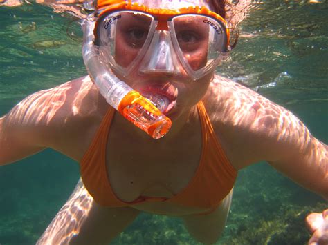 Free Photo Woman In Orange Bikini Underwater With Snorkel Adventure