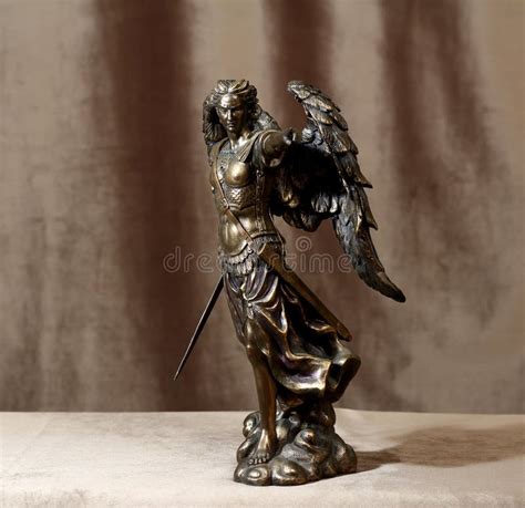 Statuette Of The Archangel Michael On A Velour Background Stock Image