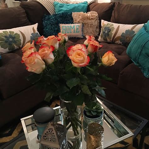 Fresh Flowers And A Cozy Couch Throw Pillows Tray Living Room Decor