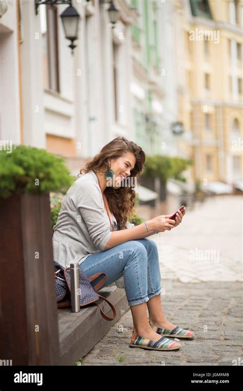 Young Woman Sitting On Stairs Hi Res Stock Photography And Images Alamy