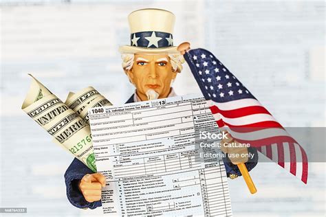 Tax Season Uncle Sam With Us Form 1040 Stock Photo Download Image Now