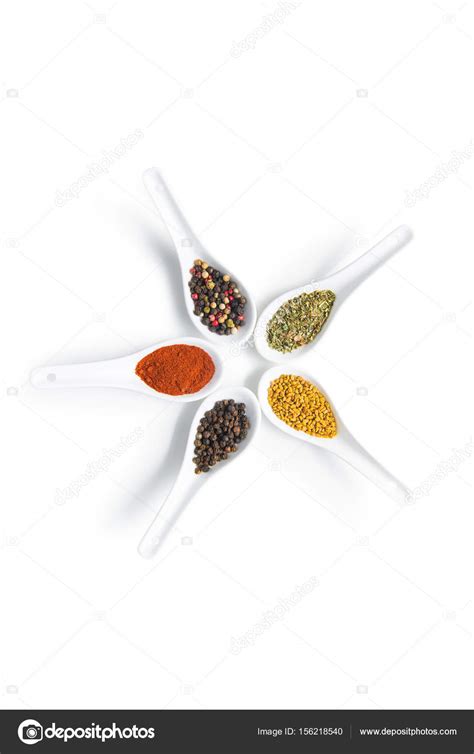 Various Spices In Spoons — Stock Photo © Igortishenko 156218540