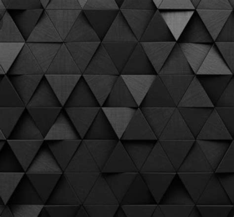 An Abstract Black And White Wallpaper With Many Triangular Shapes In