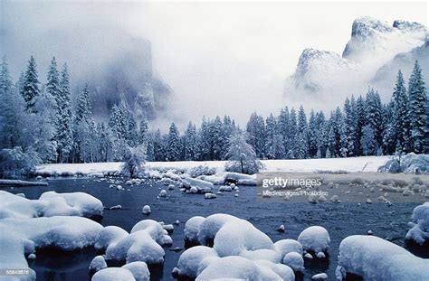 Snow Covered Mountain Peaks And Trees Merced River Yosemite National