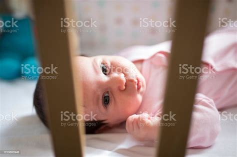 Cute Baby Girl Sleeping In Crib Stock Photo Download Image Now 0 1