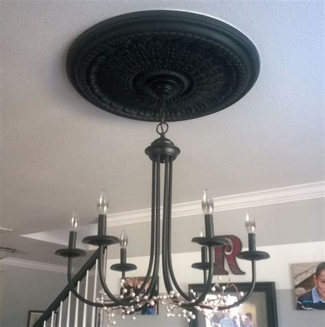 You can purchase large and small medallions for your ceiling. I loved my ceiling medallion but disliked how it was ...