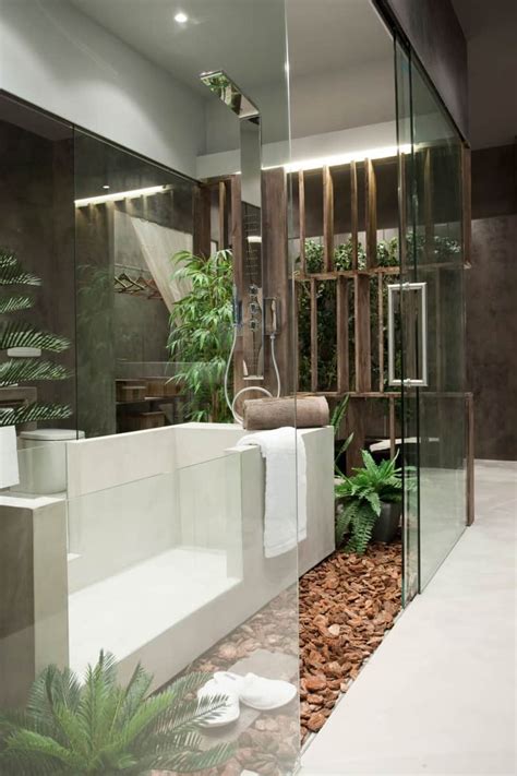 An Exotic Indoor Garden Surrounding A Zen Inspired Bath