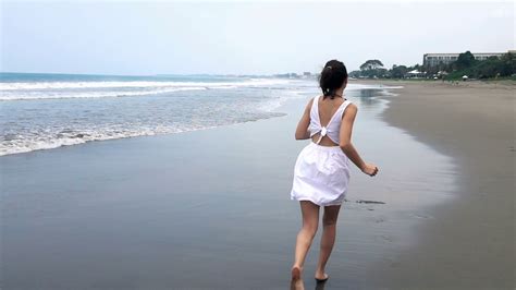 Young Beautiful Woman Running On Beach Super Slow Motion Stock Video