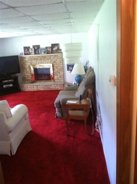 Red, grey and brown foyer. What colors go with red carpet