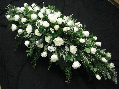 Pure And Simplistic This Casket Spray Made With Elegant White Roses