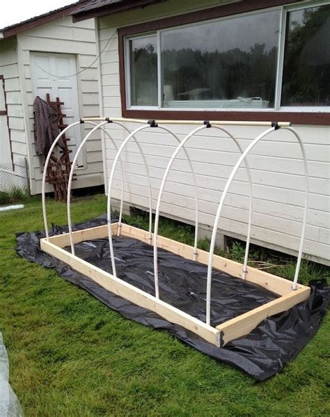 Creating a raised bed garden. DIY Raised Garden Bed With Cover | The Owner-Builder Network