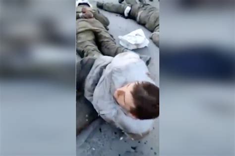 Ukraine To Probe After Videos Show Alleged Russian Pows Shot
