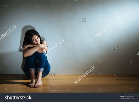 Sadness Despair Girl Looking At Light Feeling Afraid Sitting On Wooden