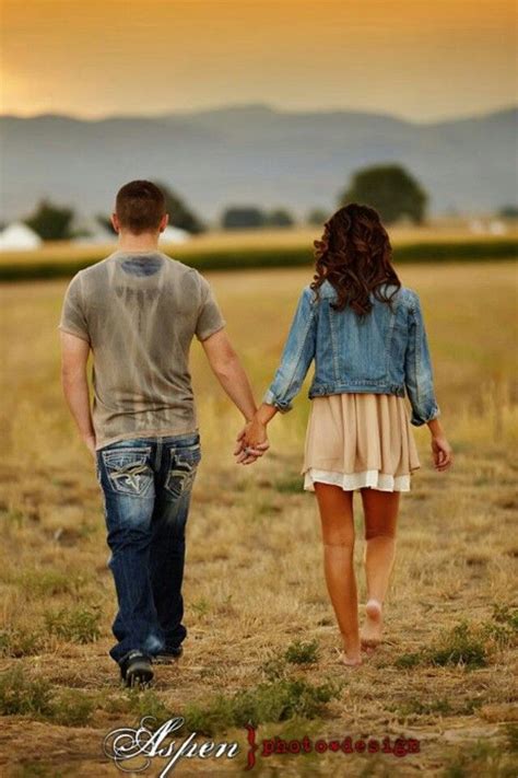 Young Couple Walking Hand In Hand Country Couple Pictures Couple