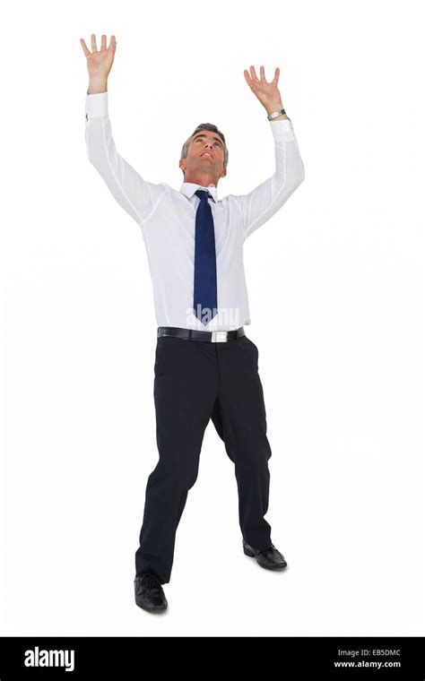 Businessman Standing With Arms Up Stock Photo Alamy