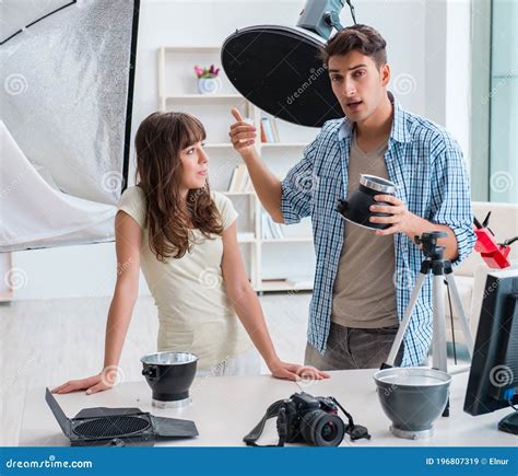 Young Photographer Working In Photo Studio Stock Image Image Of