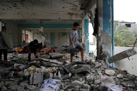 Gaza Hospital Reports 37 Dead In Strike On Un School Israel Says Used