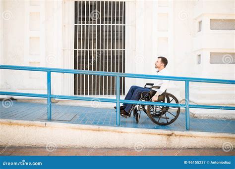 Building Ramp For Wheelchair Entry And Stairs With Colorful Pavers