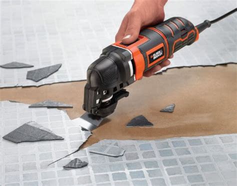 Scraping linoleum flooring tile adhesive, ceramic tile adhesive, removal of linoleum, carpet tiles & sealant removal. Black + Decker 300 W Multifunktionswerkzeug, inkl. 11-tlg ...