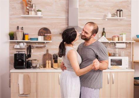 Young Couple Slow Dancing Kitchen Stock Photos Free And Royalty Free