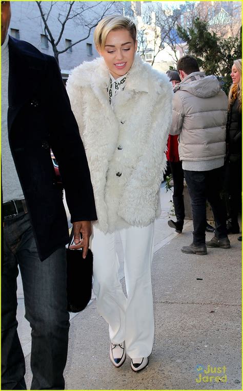 Full Sized Photo Of Miley Cyrus White Fur Coat 04 Miley Cyrus To Perform At New Years Rockin