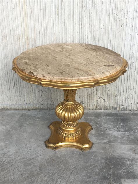 I filmed this back in december and finally recorded the voiceover for it. Gold Wood Italian Hollywood Regency Marble Top End Tables For Sale at 1stdibs
