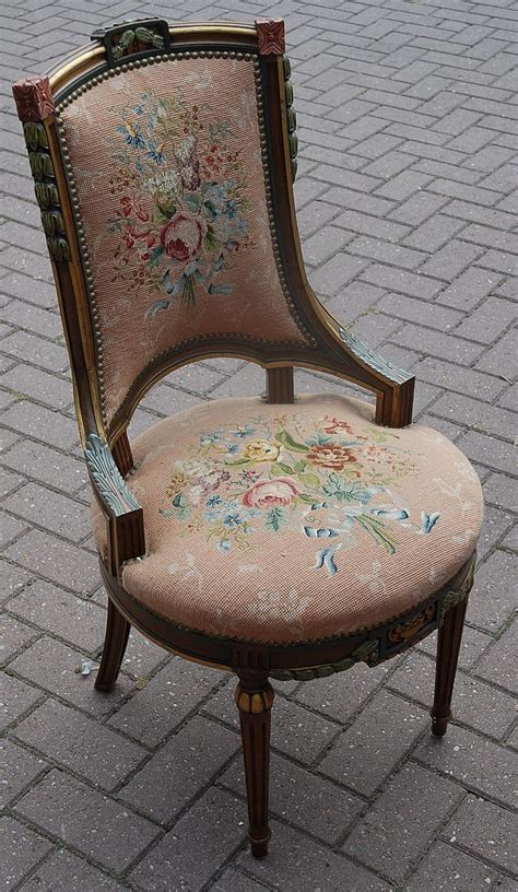 Focusing on small batches and big color since 2016. A Lovely Antique Carved Wood Polychrome Chair with Floral Needlepoint from europeantiqueshop on ...