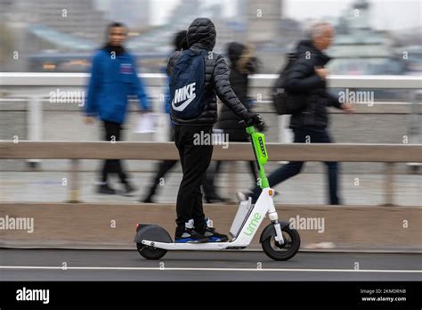 A Man Riding On A Lime E Scooter Part Of The Transport For London E