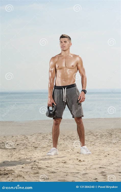 Man With A Naked Body Doing Kettlebell Exercise Stock Photo Image Of